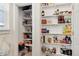 Organized walk-in pantry with shelving, providing plenty of storage for food and kitchen items at 479 Blue Lake Trl, Lafayette, CO 80026