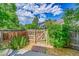 Private backyard oasis featuring a charming wooden fence and lush greenery for a serene retreat at 1229 James Cir # 1, Lafayette, CO 80026