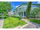 Charming townhome featuring a well-manicured front lawn and inviting front porch at 1229 James Cir # 1, Lafayette, CO 80026