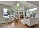 Bright and airy living room with fireplace, hardwood floors and lots of sunlight at 1229 James Cir # 1, Lafayette, CO 80026