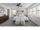 Bright bedroom with cozy decor, a ceiling fan, and plush carpeting at 13860 Ash Cir, Thornton, CO 80602