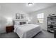 Cozy bedroom with neutral tones and natural light showcasing a peaceful retreat at 13860 Ash Cir, Thornton, CO 80602