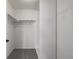 Walk-in closet provides ample storage space with shelving and hanging rods at 13860 Ash Cir, Thornton, CO 80602