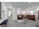 Spacious living room with comfortable leather sectional and stylish decor at 13860 Ash Cir, Thornton, CO 80602