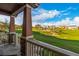 Scenic view from porch overlooking community green space, playground, and neighborhood homes at 13860 Ash Cir, Thornton, CO 80602