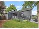 Beautiful backyard features a multi-level deck and patio area, perfect for outdoor entertaining at 18056 E Bellewood Dr, Aurora, CO 80015