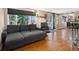 Cozy living room with large windows and comfortable seating at 8340 London Ln, Conifer, CO 80433