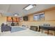 Cozy basement features a wood burning stove, neutral decor, and recessed lighting at 34101 Columbine E Trl, Elizabeth, CO 80107
