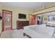 Bedroom with a TV, closet with mirrored doors, and a comfortable bed at 34101 Columbine E Trl, Elizabeth, CO 80107