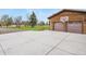 Expansive driveway leading to a two-car garage, complete with a basketball hoop, for recreational fun at 34101 Columbine E Trl, Elizabeth, CO 80107