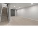 Spacious unfinished basement with clean flooring, recessed lighting, and access to storage at 6511 S Cedar St, Littleton, CO 80120