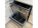 Modern kitchen showcasing a stainless steel dishwasher with convenient drawer design at 6511 S Cedar St, Littleton, CO 80120