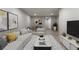 Comfortable open floor plan with modern furniture, stylish decor, and plenty of natural light at 6511 S Cedar St, Littleton, CO 80120