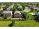 Aerial view of a well-kept backyard with wood deck, patio and green lawn near a neighborhood park at 22501 E Belleview Pl, Aurora, CO 80015