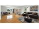Spacious recreation room includes exercise equipment, comfortable seating and stylish decor at 22501 E Belleview Pl, Aurora, CO 80015