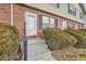 Townhome entry with steps leading to the front door at 16373 E 17Th Pl # B, Aurora, CO 80011