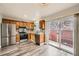 Kitchen with stainless steel appliances and granite countertops at 16373 E 17Th Pl # B, Aurora, CO 80011