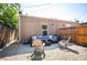 Private backyard with a patio seating area perfect for relaxing and entertaining at 2645 W 24Th Ave, Denver, CO 80211