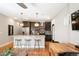 Modern kitchen with granite countertops, stainless steel appliances, and ample cabinet space at 2645 W 24Th Ave, Denver, CO 80211