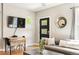 Cozy living room with stylish furnishings, hardwood floors, and natural light creates a welcoming atmosphere at 2645 W 24Th Ave, Denver, CO 80211
