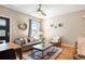 Stylish living room with modern decor, hardwood floors, and comfortable seating area with rug at 2645 W 24Th Ave, Denver, CO 80211
