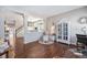 Cozy living room with hardwood floors, fireplace, and comfortable seating at 5907 E Tabor Pl, Castle Rock, CO 80104