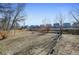 Large backyard with a partially fenced area at 12300 Cameron Dr, Brighton, CO 80603