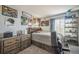 Cozy bedroom features custom built-in bed frame and wall decor at 20338 E 48Th Dr, Denver, CO 80249