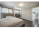 Comfortable bedroom features a desk and gray walls, providing a functional space at 20338 E 48Th Dr, Denver, CO 80249