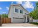 Charming two-story home with an attached garage and inviting front porch at 20338 E 48Th Dr, Denver, CO 80249