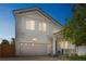Charming two-story home with an attached garage and inviting front porch at 20338 E 48Th Dr, Denver, CO 80249