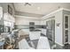 Open kitchen featuring stainless appliances, granite countertops, and adjacent dining area at 20338 E 48Th Dr, Denver, CO 80249