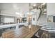 Spacious living area featuring wood floors, lots of natural light and open floor plan at 20338 E 48Th Dr, Denver, CO 80249