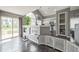 Bright and airy open floor plan featuring kitchen, dining, and living areas at 20338 E 48Th Dr, Denver, CO 80249