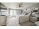 Bright primary bedroom with ample closet space and large windows at 20338 E 48Th Dr, Denver, CO 80249