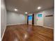 Spacious living room featuring hardwood floors and natural light at 921 Dakin St, Denver, CO 80221