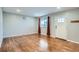 This living room has wood floors, and the walls are painted gray to match the window treatments at 921 Dakin St, Denver, CO 80221