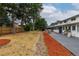 The unit has a large backyard area. Includes a patio and bark mulch, some grassy areas, and fencing at 4960 E Donald Ave # 11, Denver, CO 80222