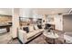 Shared amenity space with seating, gym equipment, and billiard table at 625 N Pennsylvania St # 108, Denver, CO 80203