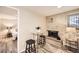Small dining area with glass table and view into bedroom at 625 N Pennsylvania St # 108, Denver, CO 80203