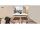 Modern kitchen with white cabinets and a breakfast bar at 625 N Pennsylvania St # 108, Denver, CO 80203
