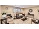 Living room features a fireplace, gray couch, and wood-look floors at 625 N Pennsylvania St # 108, Denver, CO 80203