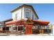 Victorian-style building housing a restaurant with outdoor seating at 625 N Pennsylvania St # 108, Denver, CO 80203