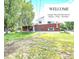Spacious backyard with a lush lawn, beautiful trees, and an inviting outdoor space for relaxation at 8030 Ogden St, Denver, CO 80229