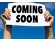 A 'Coming Soon' sign, hinting at new real estate opportunity at 8030 Ogden St, Denver, CO 80229