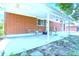 Outdoor covered patio features an extended seating area for Gathering and guest entertainment at 8030 Ogden St, Denver, CO 80229