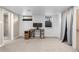 Bright finished basement features a desk area with natural light from two windows at 4501 Zenobia St, Denver, CO 80212