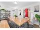 Bright dining area with modern bench seating, large windows, and stylish accents at 4501 Zenobia St, Denver, CO 80212