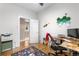 Bright home office featuring hardwood floors, desk, and a floral rug at 4501 Zenobia St, Denver, CO 80212