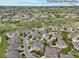 A scenic aerial view of homes in a residential community near Southlands Shopping in Aurora, Colorado at 22342 E Plymouth Cir, Aurora, CO 80016